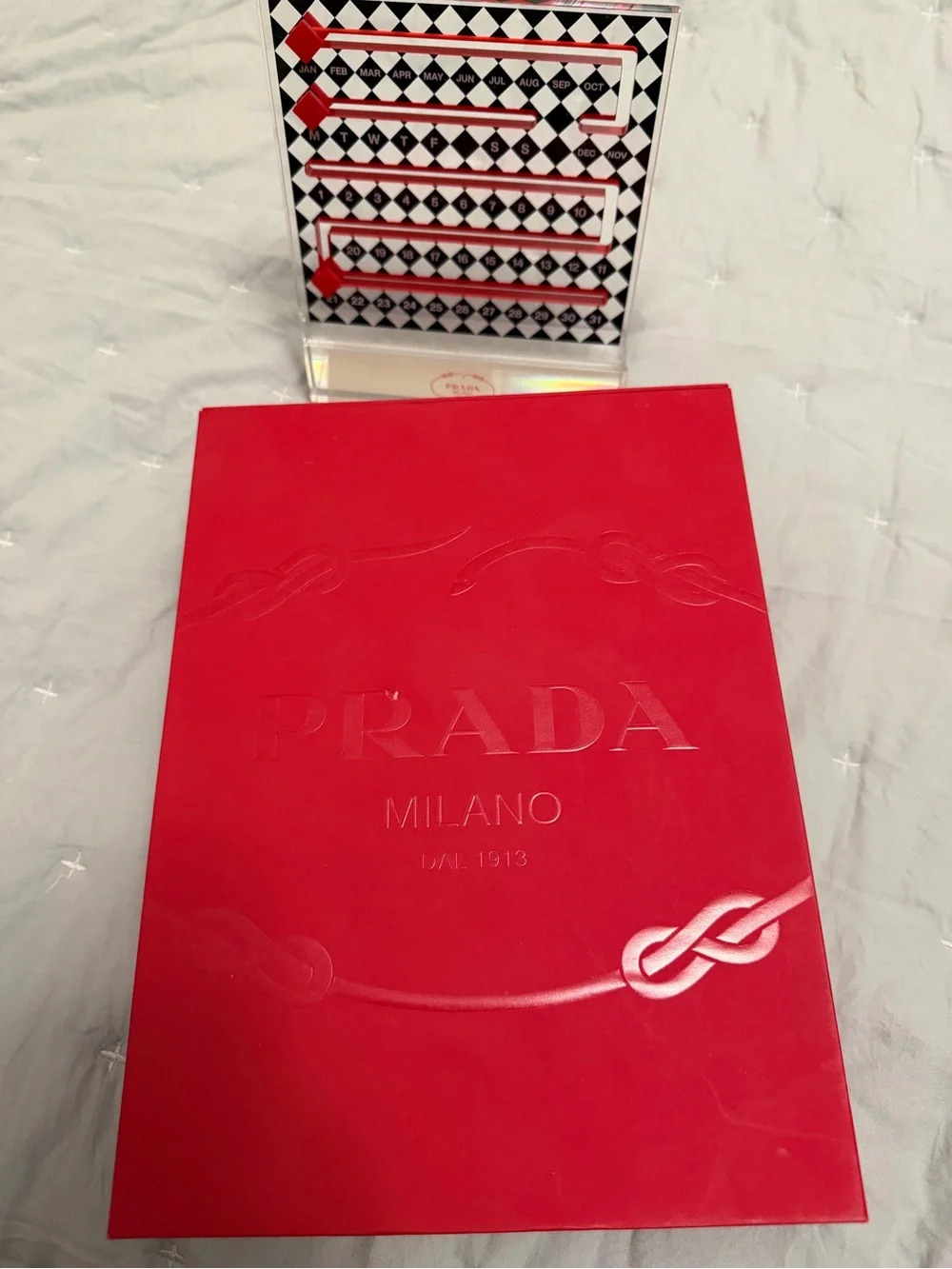 Prada Black & White Acrylic Perpetual Calendar with Red Markers